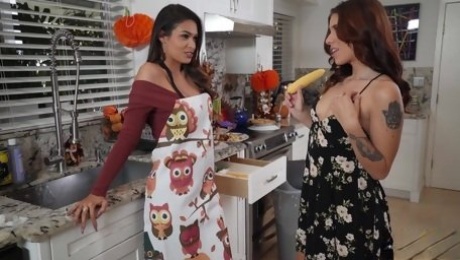 Katana Kombat and Isabel Moon play with sex toys in the kitchen